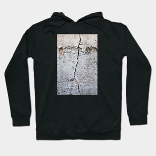 Single crack on a rough concrete texture Hoodie